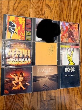 Assorted Lot Bundle Of CD’S Including AC/DC, Def Leppard  (2CDS for $25)